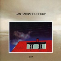 Purchase Jan Garbarek Group - Photo With Blue Sky, White Cloud, Wires, Windows And A Red Roof